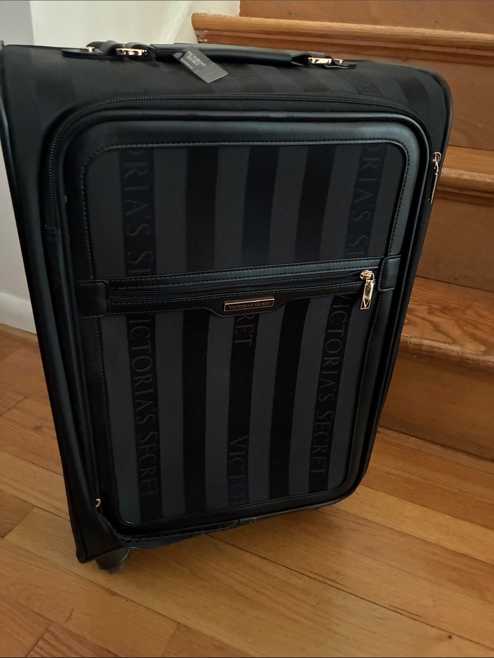 Victoria's Secret Black Vertical Stripe Rolling Suitcase
